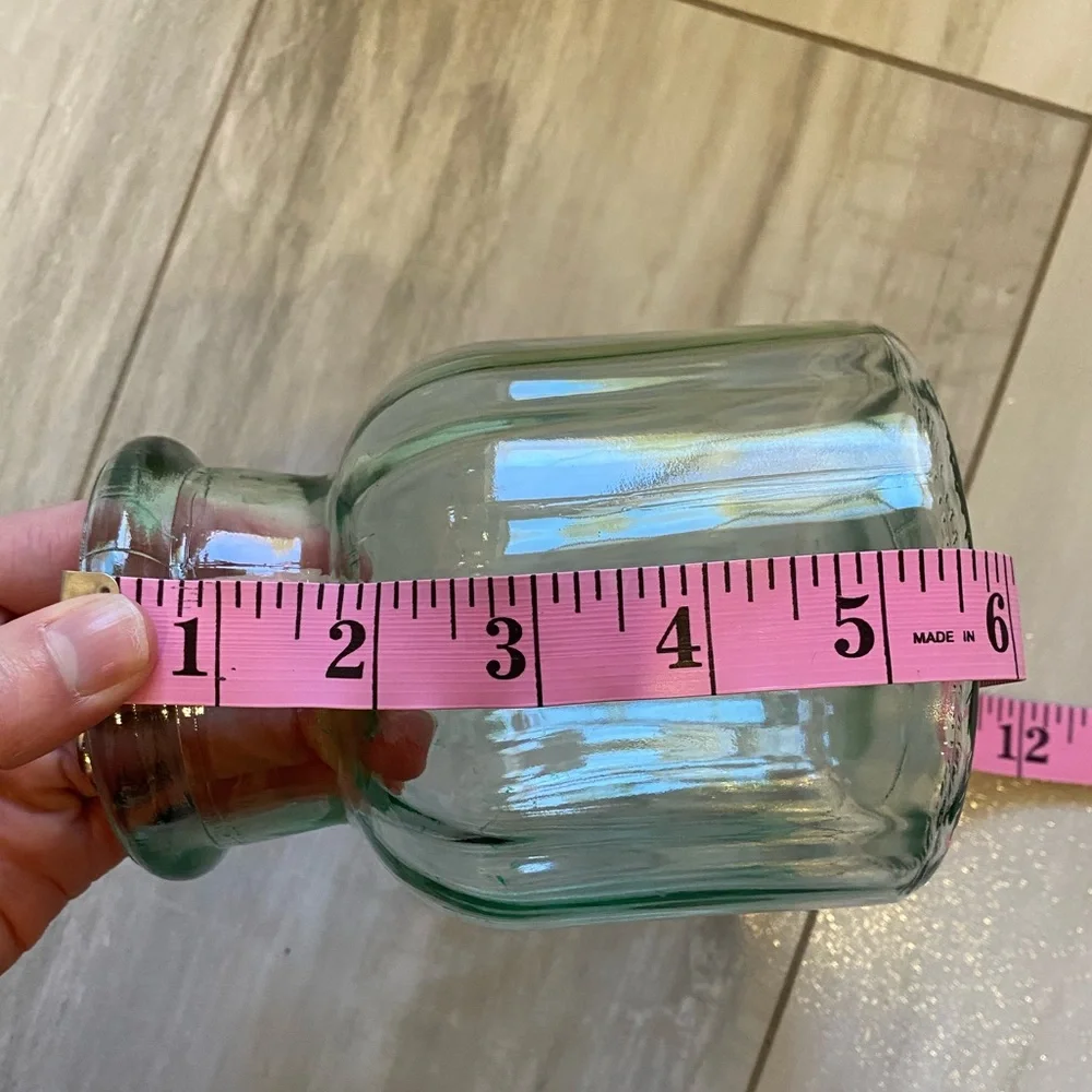 Bundle of Clear Round and Light Green Circular Textured Glass Vases